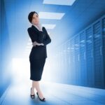 businesswoman standing in a data center