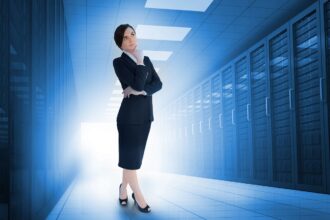 businesswoman standing in a data center