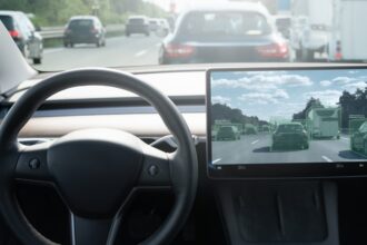 shutterstock 2281315585 inside view of self driving car on a road. Autonomous vehicle.