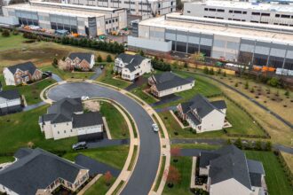 An Amazon Web Services data center under construction near homes in Stone Ridge, Virginia, on March 27.