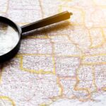 Magnifying glass on a map of the United States