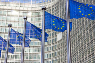 Flags in front of the EU Commission building in Brussels