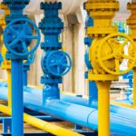 shutterstock 1921909664 blue and yellow pipelines and valves at a gas plant