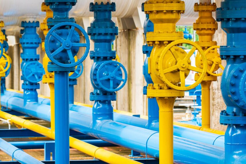 shutterstock 1921909664 blue and yellow pipelines and valves at a gas plant