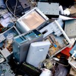 pile of discarded electronic devices