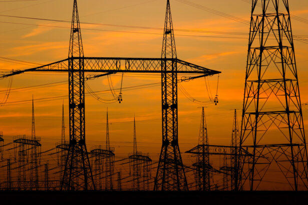 High voltage towers at sunset