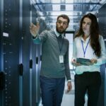 italy-data-center-man-woman-it-specialist-mainframe