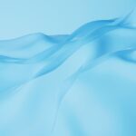 shutterstock 2213339841 flowing fabric cyan cloth background