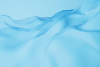 shutterstock 2213339841 flowing fabric cyan cloth background