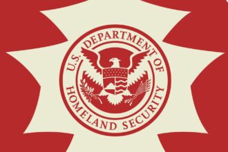 Illustration of the seal for the US Department of Homeland Security on a red and tan background.