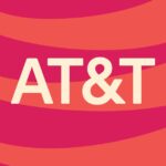 AT&amp;T logo with an illustrated red and orange background.