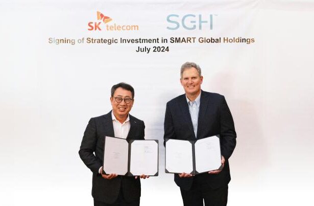 The image shows SK Telecom CEO Yoo Young-sang left and Smart Global Holdings CEO Mark Adams right signing a 200 million investment agreement in Los Altos California marking their collaboration in AI infrastructure solutions Courtesy of SKT