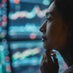 woman contemplating analytics