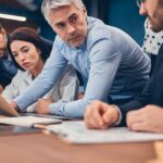 Smart confident people having a business meeting while working in the office