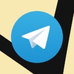 A picture of Telegram’s paper airplane logo surrounded by yellow triangular shapes