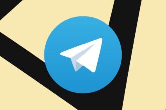 A picture of Telegram’s paper airplane logo surrounded by yellow triangular shapes