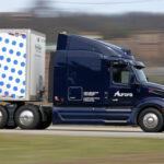 Autonomous truck company Aurora delays hauling freight without human drivers until April