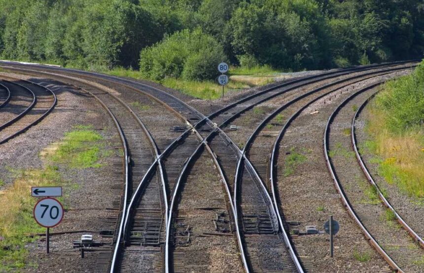 shutterstock 1547202 railway junction with train tracks curving to left and right