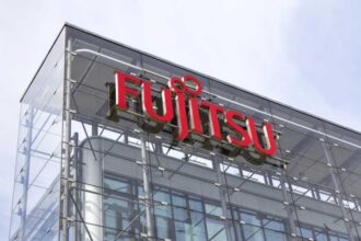 A photograph of a building with the Fujitsu logo on the facade.