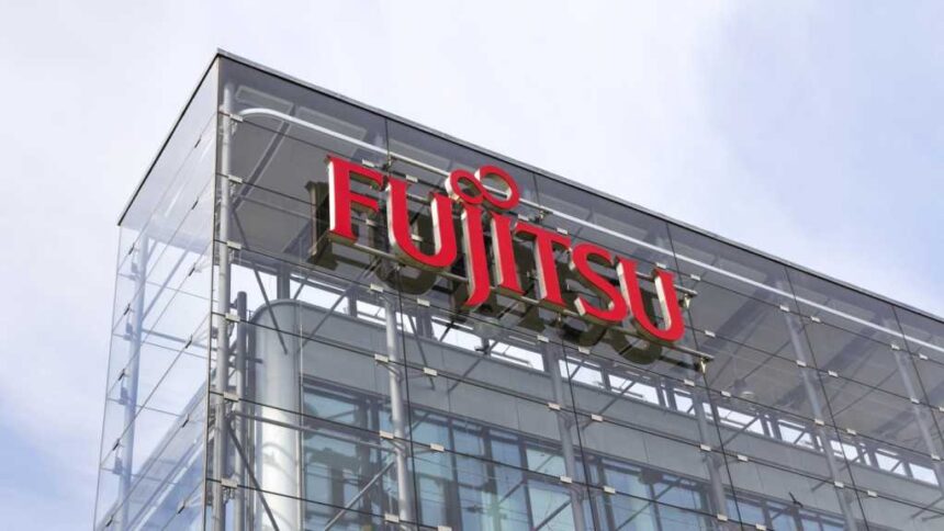 A photograph of a building with the Fujitsu logo on the facade.