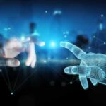 Wireframed Robot hand connecting with human hand on dark background. Agentic AI.