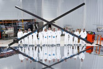 Team photo in cleanroom