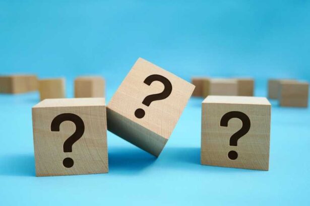 Three building blocks with question marks.