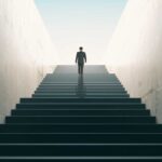 Ambitions concept with businessman climbing stairs