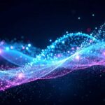 A wave of small particles flowing seamlessly in an abstract design.