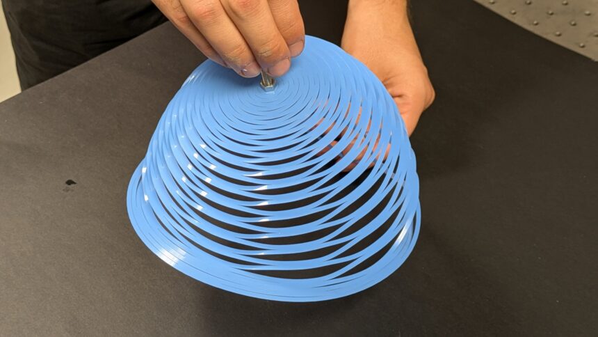 Kirigami parachute suitable for humanitarian missions stabilizes quickly and doesn't pitch