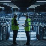 data-center-network-racks-men-engineers