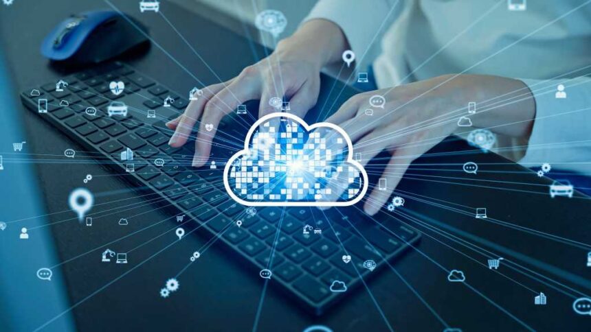 Cloud computing concept with engineer using computer in office.