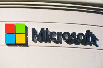 Microsoft sign and logo on the facade of corporation campus in Silicon Valley. The company headquartered in Redmond, Washington - Mountain View, California, USA - 2019