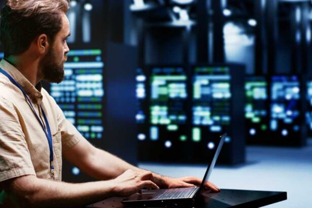 System administrator typing supercomputer hub disaster recovery plan on laptop to provide fast restoration of service, limiting damage and minimizing interruptions to normal operations