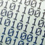 Binary number system, bits, binary numbers on an LCD display abstract wide background, banner, backdrop. Calculator screen macro, closeup, nobody. Math and computer science, electrical engineering