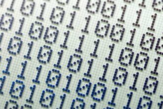 Binary number system, bits, binary numbers on an LCD display abstract wide background, banner, backdrop. Calculator screen macro, closeup, nobody. Math and computer science, electrical engineering