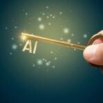 Unlock potential of AI (artificial intelligence) concept. Hand with golden key and acronym AI. Key to success with use of AI.