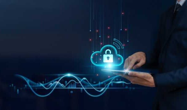 Cloud Security Concept: Businessman uses tablet on Secure Global Networking, Data Encryption, Firewall Protection, Continuous Monitoring, to Develop Smart Solutions from Digital Technology.