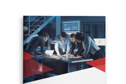 A group of professionals collaborating over a document titled