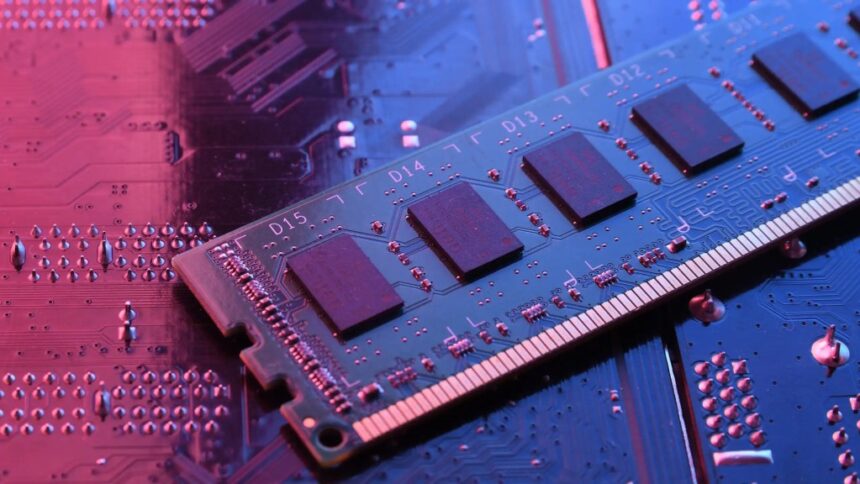 RAM memory stick module exposed and sitting on a circuit board